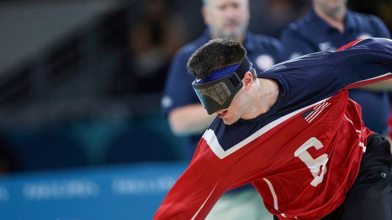 Sweat drops from Calahan Young, U.S. goalball team captain, as...