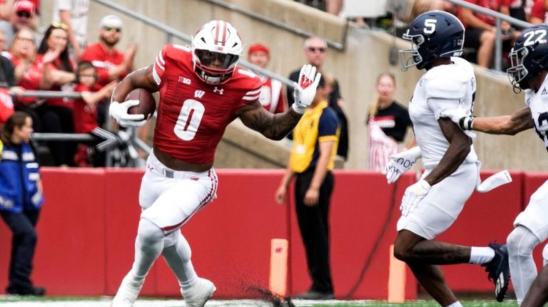 Wisconsin's Braelon Allen runs during the second half of an...