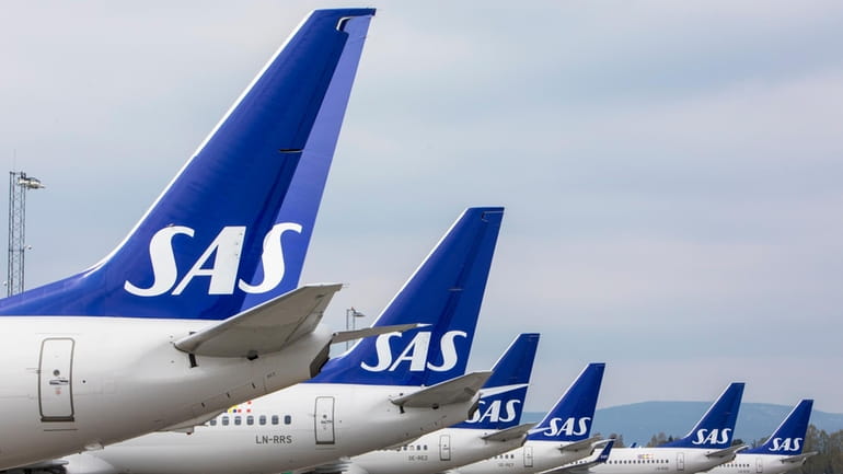 SAS planes are grounded at Oslo Gardermoen airport, in Oslo,...