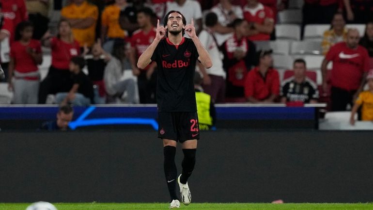 Salzburg's Roko Simic celebrates scoring his side's opening goal during...