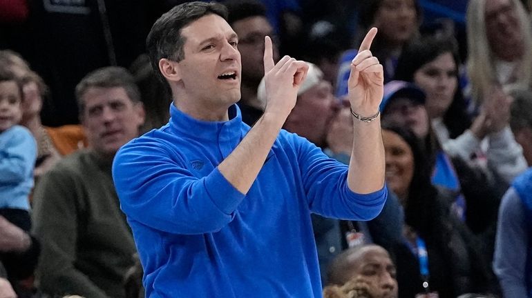 Oklahoma City Thunder head coach Mark Daigneault gestures in the...