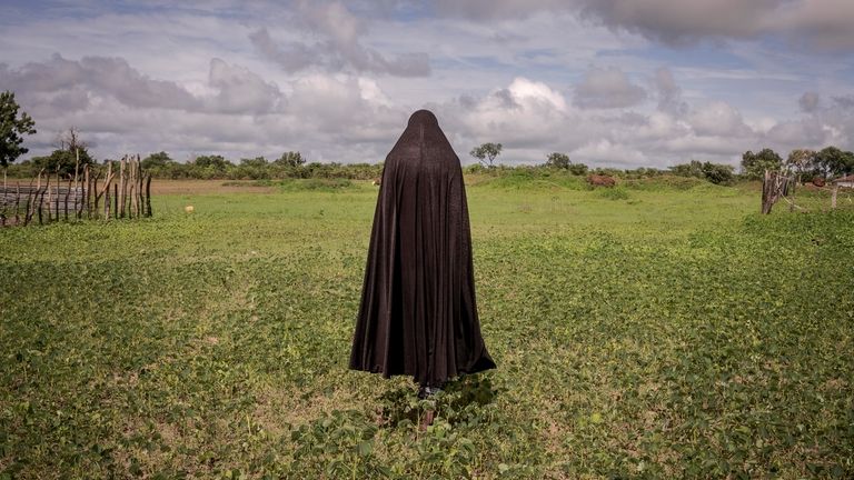 Meta, a survivor of female genital mutilation, poses for a...