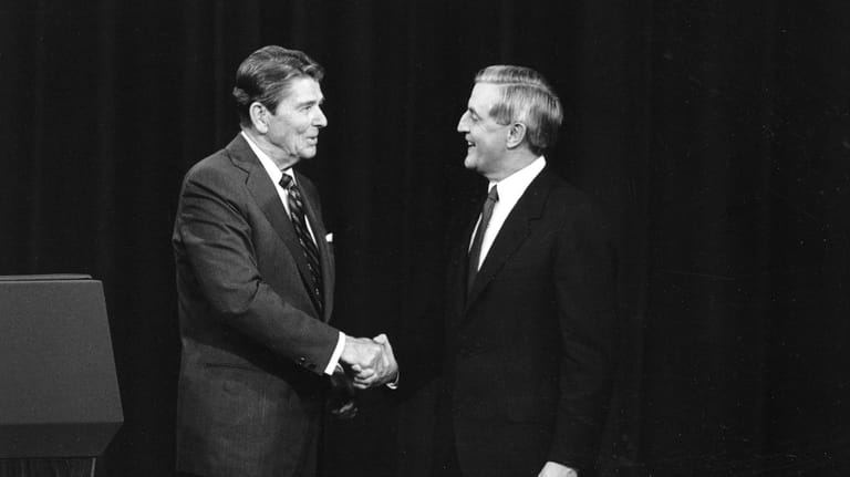 President Ronald Reagan, left, and his Democratic challenger Walter Mondale,...
