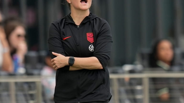 United States interim head coach Twila Kilgore calls to her...