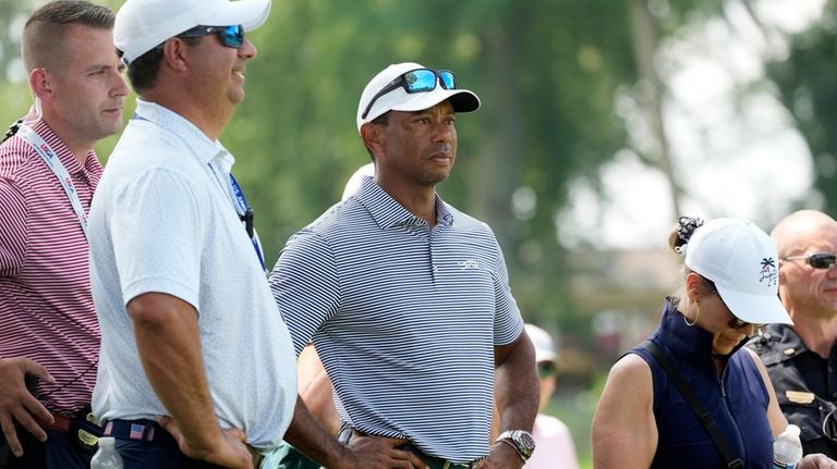 Tiger Woods watches his son Charlie Woods play during the...