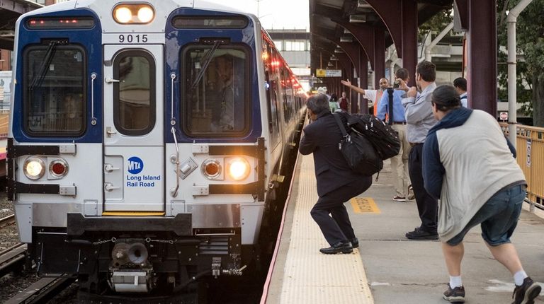 LIRR riders snap photos of a new M9 train pulling...