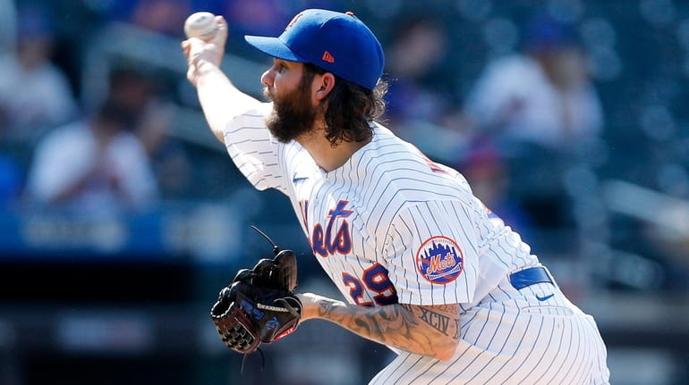 Trevor Williams of the Mets pitches against the Nationals in the...