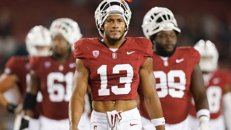 Stanford Cardinal wide receiver Elic Ayomanor (13) reacts after losing...