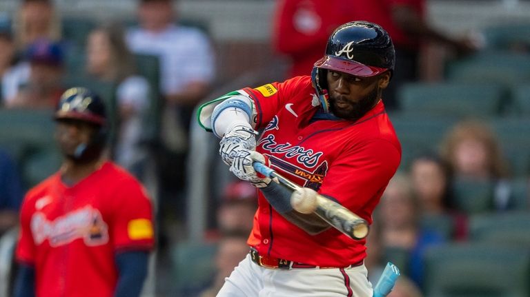 Atlanta Braves' Michael Harris II hits a line drive to...