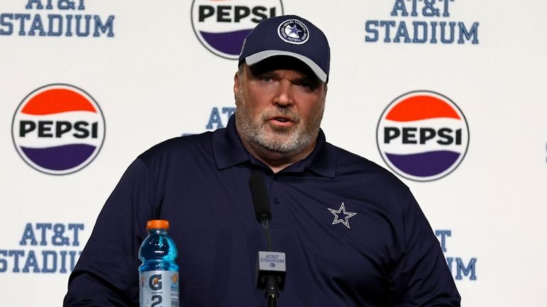 Dallas Cowboys head coach Mike McCarthy responds to questions during...