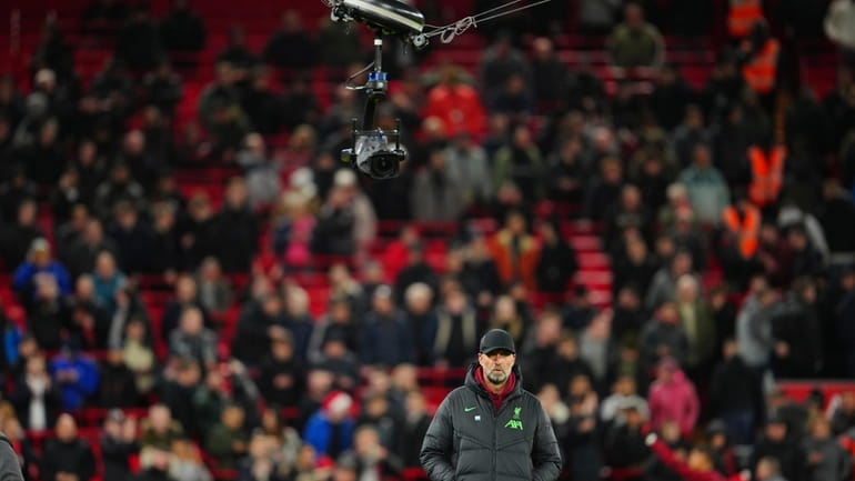 Liverpool's manager Jurgen Klopp stands during a warm up before...