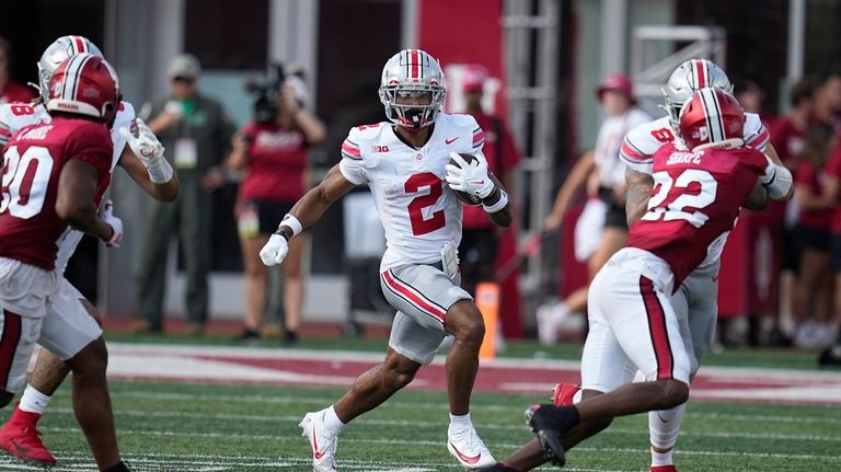 Ohio State wide receiver Emeka Egbuka (2) runs during the...