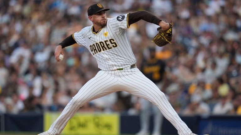 San Diego Padres starting pitcher Joe Musgrove works against a...