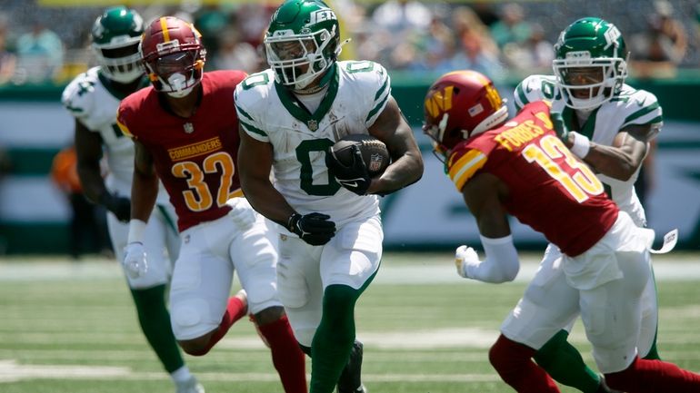 New York Jets running back Braelon Allen (0) runs with...