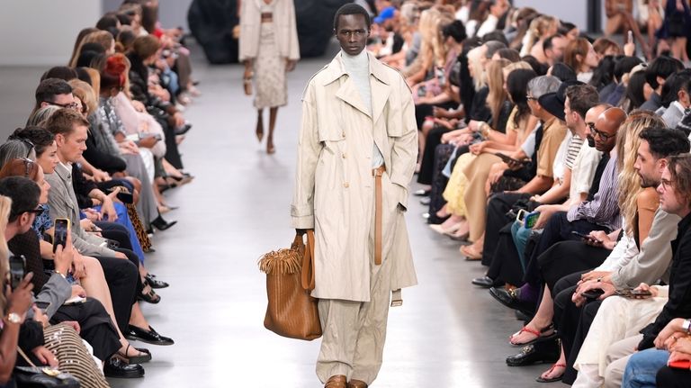 A model walks the runway during the Michael Kors Collection...