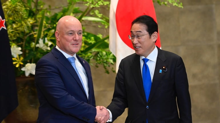 New Zealand Prime Minister Christopher Luxon, left, and Japan Prime...