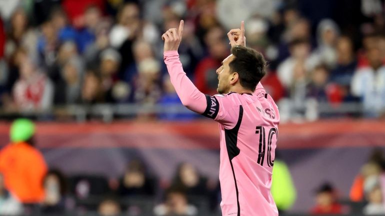 Inter Miami forward Lionel Messi reacts after scoring in the...