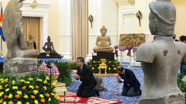 In this photo released by Agence Kampuchea Press (AKP), Cambodian...