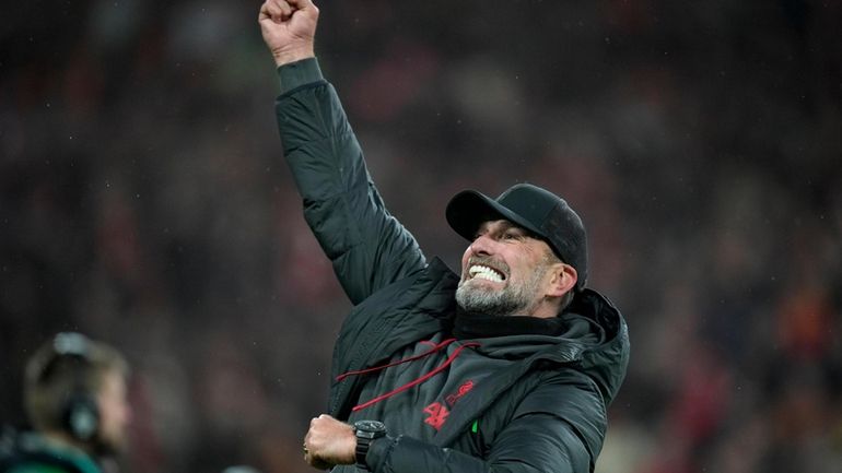 Liverpool's manager Jurgen Klopp celebrates after his team won the...