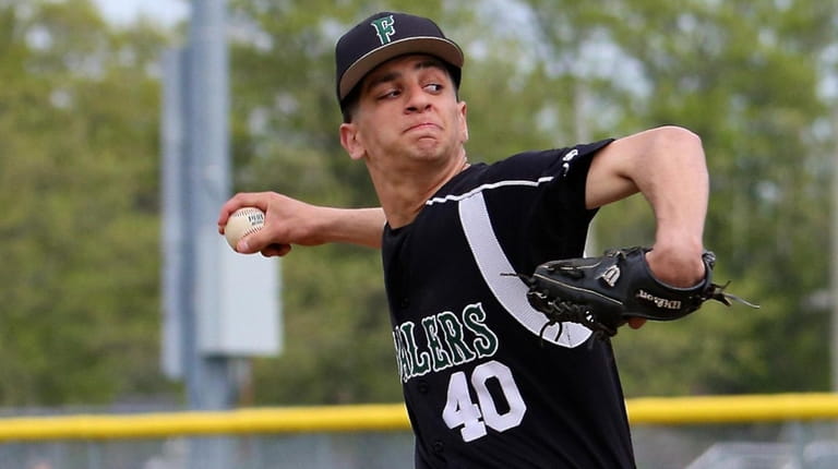 Farmingdale starting pitcher Justin Rosner delivers a pitch in the...