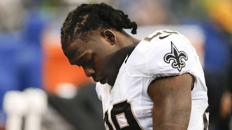 Khiry Robinson walks off the field after the loss. (Jan....