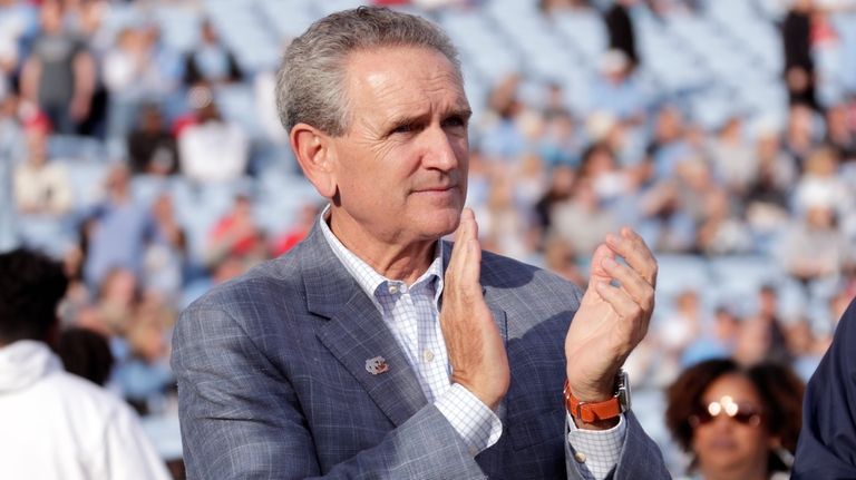 North Carolina athletic director Bubba Cunningham applauds the seniors before...