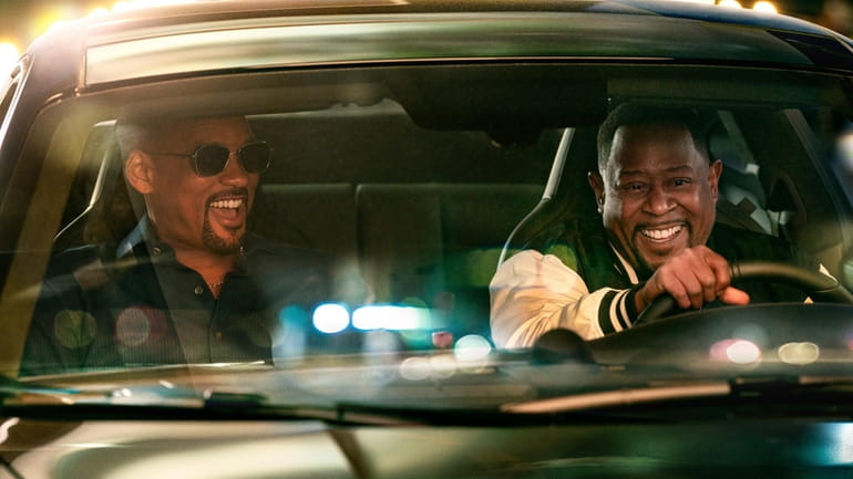 This image released by Sony Pictures shows Will Smith, left,...