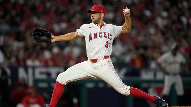 Los Angeles Angels starting pitcher Tyler Anderson throws during the...