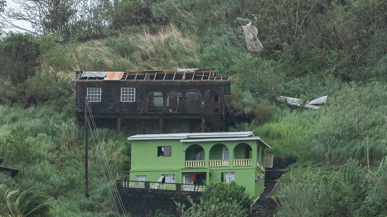 Houses damaged by Hurricane Beryl in Kingstown, Srt. Vincent and...