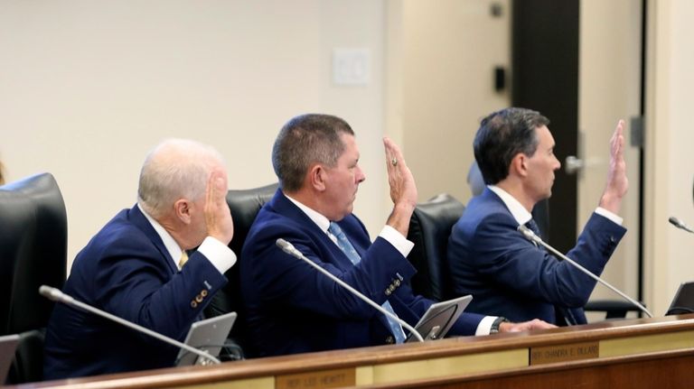 Santee Cooper CEO Jimmy Staton, left, Dominion Energy South Carolina...