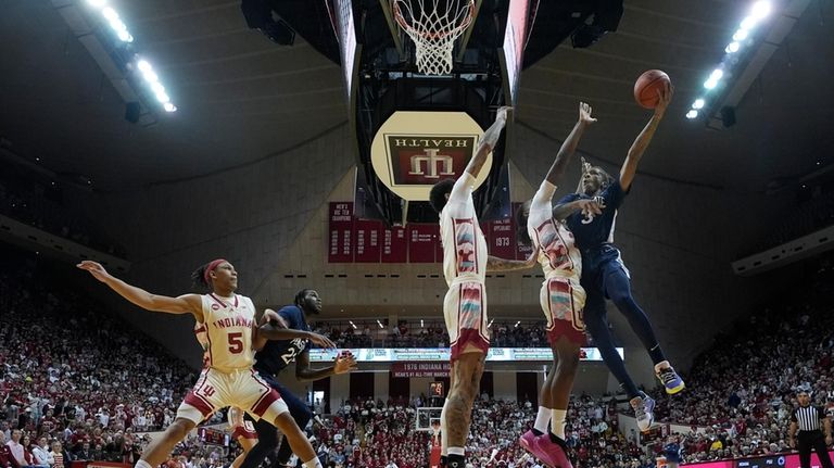 Penn State's Nick Kern Jr. (3) puts up a shot...