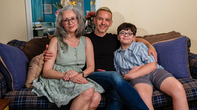 Joe Anastasi, center, with his wife, Penny, and son, Dillon.