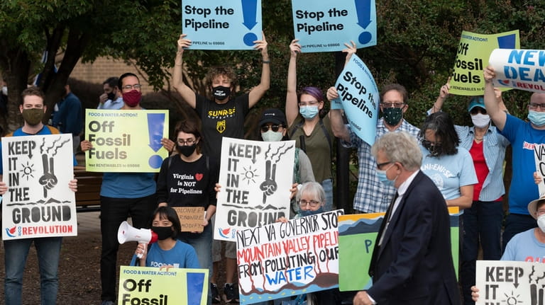 Demonstrators against the Mountain Valley Pipeline protest at Northern Virginia...