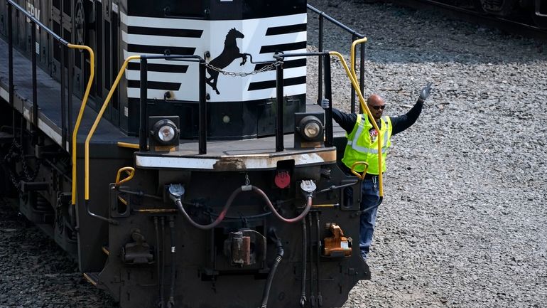 Norfolk Southern locomotives are moved through the Conway Terminal in...