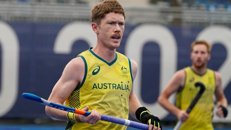 Australia's Matthew Dawson runs the pitch during a men's field...