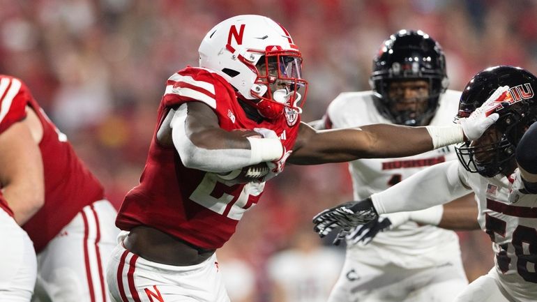 Nebraska's Gabe Ervin Jr. (22) rushes against Northern Illinois' Skyler...