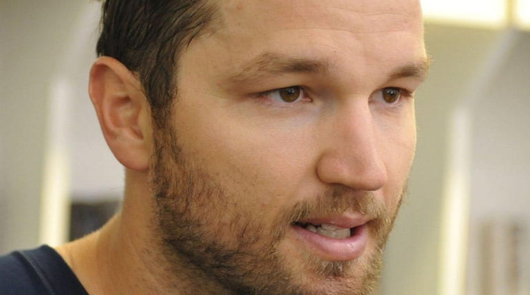 Rick Nash of the New York Rangers speaks with the...