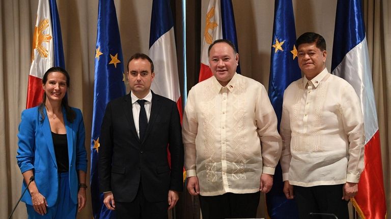 From left, French ambassador to the Philippines Marie Fontanrl, French...