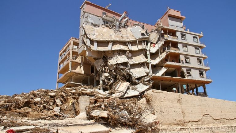 Damage from massive flooding is seen in Derna, Libya, Wednesday,...