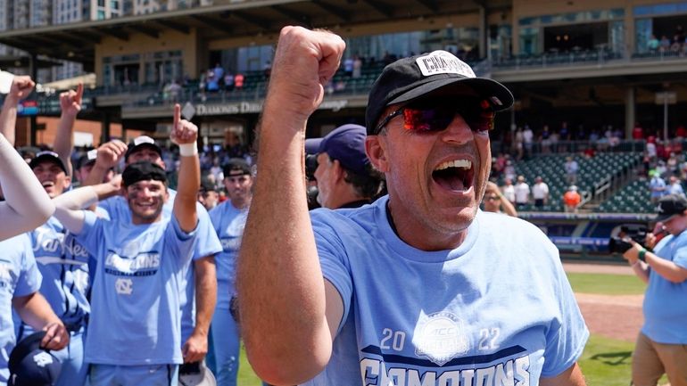 North Carolina head coach Scott Forbes celebrates their win against...