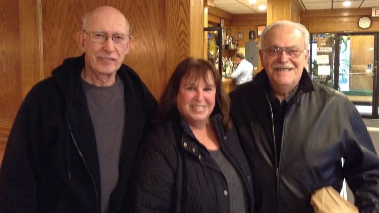 Phil Sheridan, left, Susan Rosenberg and Dan Visconti at the...