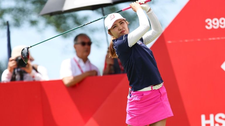 Ayaka Furue of Japan plays a shot on 10th tee...