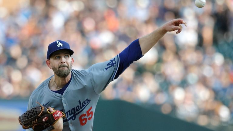 Los Angeles Dodgers' James Paxton pitches against the Detroit Tigers...