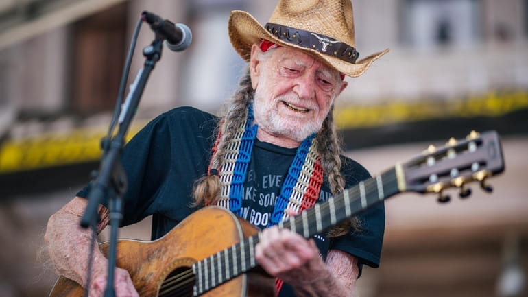 Willie Nelson performs during the Georgetown to Austin March for...