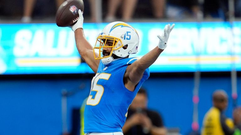 Los Angeles Chargers wide receiver Jalen Guyton (15) celebrates his...