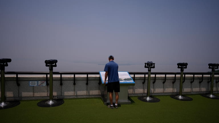 A visitor looks at the map of North Korean side...