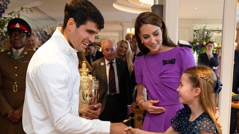 Carlos Alcaraz of Spain meets Princess Charlotte with Kate, Princess...