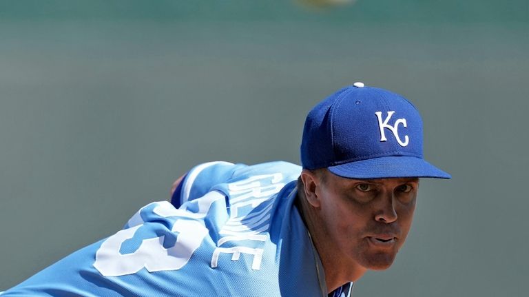 Kansas City Royals starting pitcher Zack Greinke throws during the...