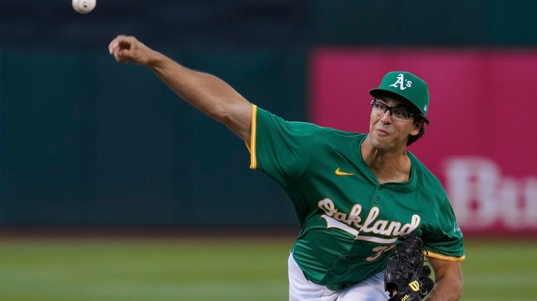 Oakland Athletics' Joe Boyle pitches to a Tampa Bay Rays...