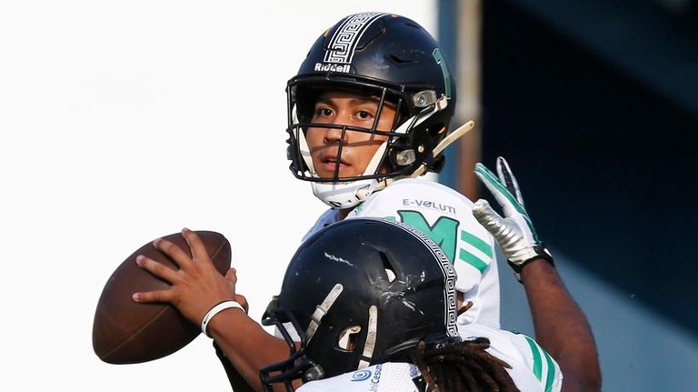 Baré Indigenous Pedro Canuto, Manaus FA's quarterback, looks for receivers...